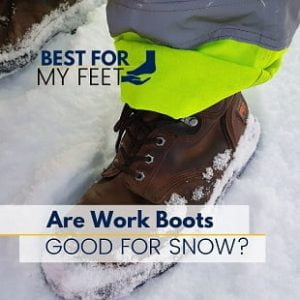 working in the snow wearing safety work boots