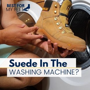 in this image the autor of this article, Adrian is holding his suede leather work boots in front of his washing machine showing that he's about to wash these suede work boots in the washer.
