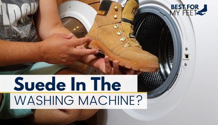 in this image the autor of this article, Adrian is holding his suede leather work boots in front of his washing machine showing that he's about to wash these suede work boots in the washer.