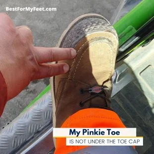 showing where the steel toe cap is versus where my pinky toe is. Not all my toes fit under the safety toe cap of a work boot and that's normal.